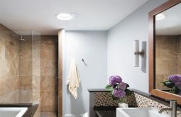 Solar tubes, Glass, and Mirrors Brighten Small Dark Bathrooms